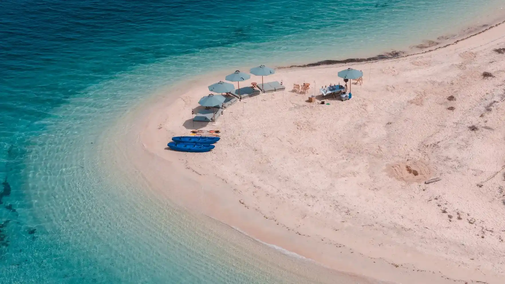 Beach setup arranged for cruise guests at Pink Beach, Komodo