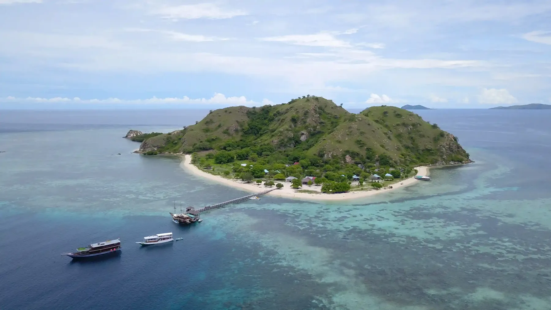 Aerial view of Kanawa Island and its house reef in the Flores Sea